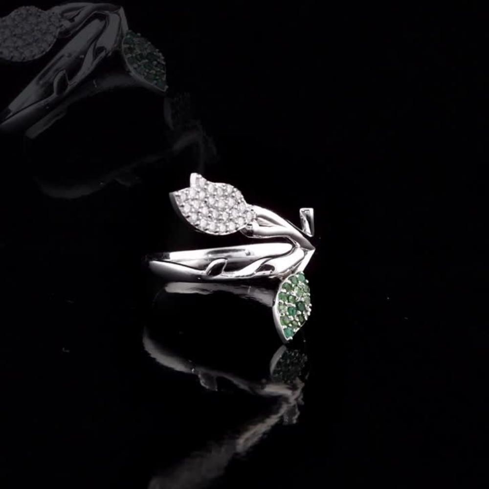 0.36 Carat Natural Diamond and Emerald Leaf Figure Ring